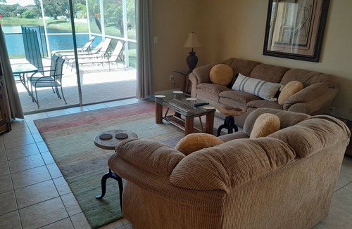 Sabal Harbour Villa | Stylish Lakefront Villa with South Facing Pool. A short drive to fine beaches.