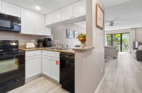 Avon By The Sea Condo | Sunny Condo w/Private Balcony, Heated Pool, and Steps to Beach Access & Pier! ☀️🏖️