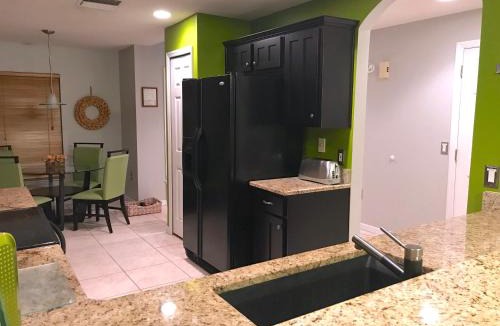 Lake Berkley Villa | Sunny South Facing Pool with Hot Tub and Lake View Near Disney