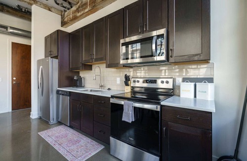 Italian Village Apartment | The Corner Suite - Renovated Factory Flat