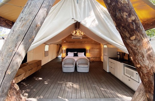 Shell Knob Cottage | The Henry Glamping Tent with Boat Dock at Rod N Reel Resort