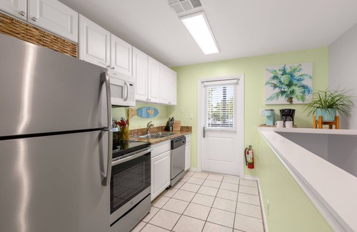 Truman Annex Condo | THE PELICAN PEARL ~ Charming 2 BR/1 Ba Condo in Truman Annex!