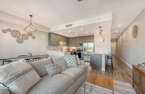 North Trail Condo | The Strand 304 - Luxury Waterfront Bay Views - Heated Pool & Spa - Near Downtown