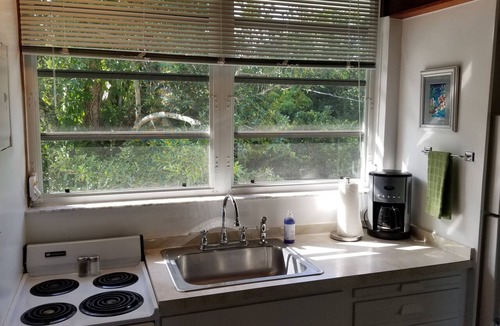 Melbourne Village Apartment | The Treehouse:Treeline View, Screened Porch, Private Balcony