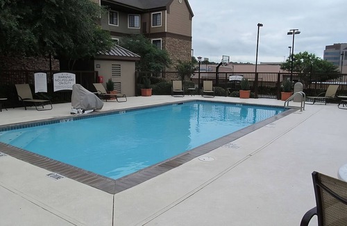 Vance Jackson Apartment | Two Comfortable 2BR Suites w/Full Kitchen | Outdoor Pool | Free Breakfast
