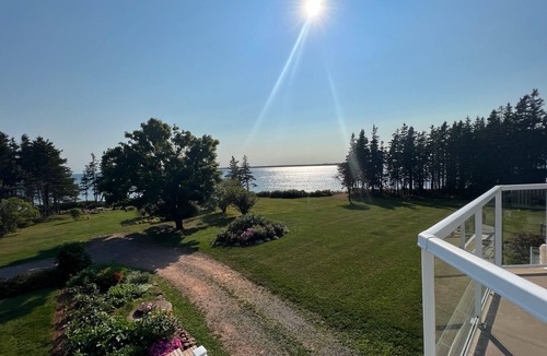 Little Pond Apartment | Upper level end unit with wate view in every direction