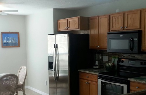 Gulf Gate Estates Condo | Vacation Rental Sarasota 2BR/1BA Condo Heated Pool, wi-fi lake view, backyard