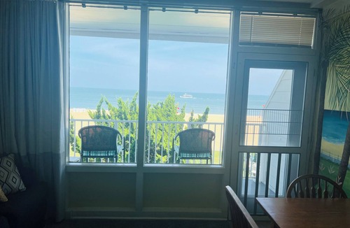 Northeast Virginia Beach Condo | VB Oceanfront Condo at Boardwalk. See Dolphins from Balcony. Steps to Beach+Pool