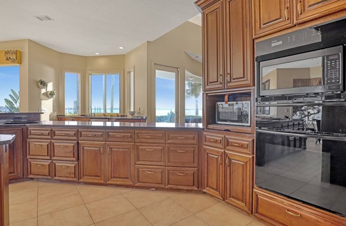 Rockledge House | Viera Riverfront Island Retreat 8bd/6ba Water Views EVERY Room Pool/Spa 16+ppl