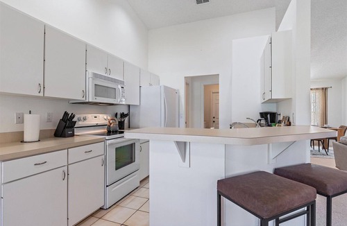 Arlington Park House | Waldemere House | Saltwater Pool | Screened Porch, Fireplace + Games