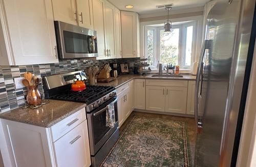 Woolford Cottage | Waterfront Fishing Creek Cottage with Guesthouse Pier-Kayaks-Fire Pit