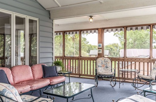 Dogue House | Waterfront home with swimming pool and tennis court.