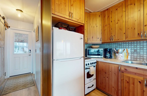 Langley House | Waterfront home with views, deck and open concept living