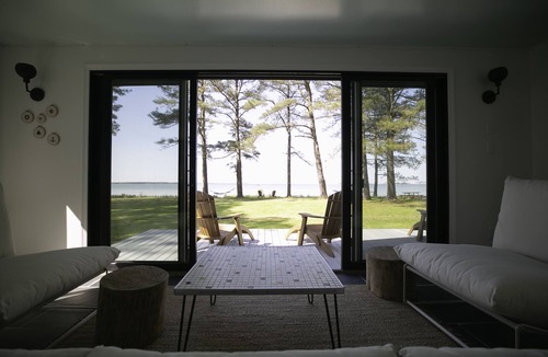 White Stone House | Waterfront, Private Beach, Mid Century Style