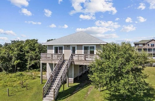 Carova Beach Cottage | Welcome to the Cool Change Beach Cottage, Canal front 4x4 area of Carova Beach.