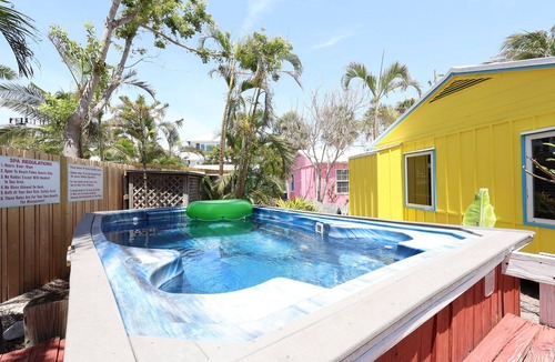 Siesta Key Village Cottage | Yellow Palm Cottage steps from the beach
