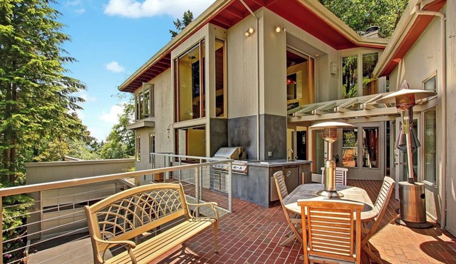 3br urban oasis with lake views, swimming pool, hot tub, steam shower and sauna.
