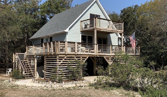 4 Bedroom 2 Bath beach retreat, quiet beaches of Southern Shores. Pets invited.