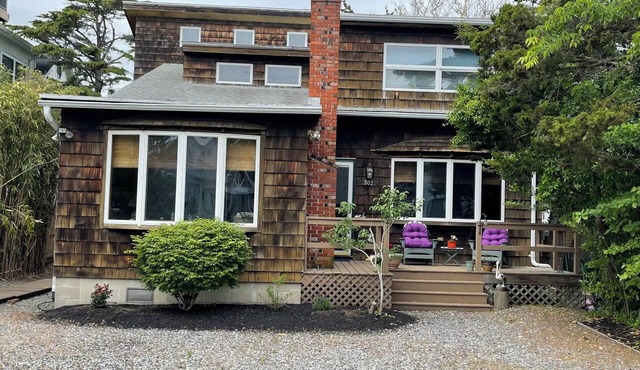4-bedroom house in lovely Cape May Point with AC a short block to the beach.