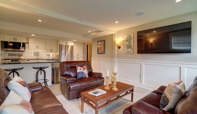 A bright and cozy Bryant apartment: 2-bedroom, dog-friendly, with private yard.