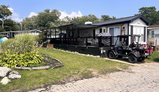 Beach view corner lot with ample space for family games or nightly bonfires!