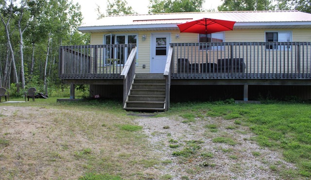 Beautiful 3 bedroom cottage in a treed setting 1/2 mile to water access.