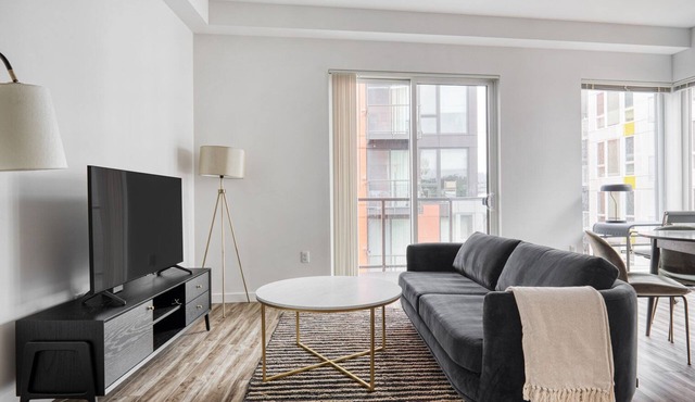 Bright Bellevue 2BR w/BBQ, Gym, W/D, near Spring District, by Blueground