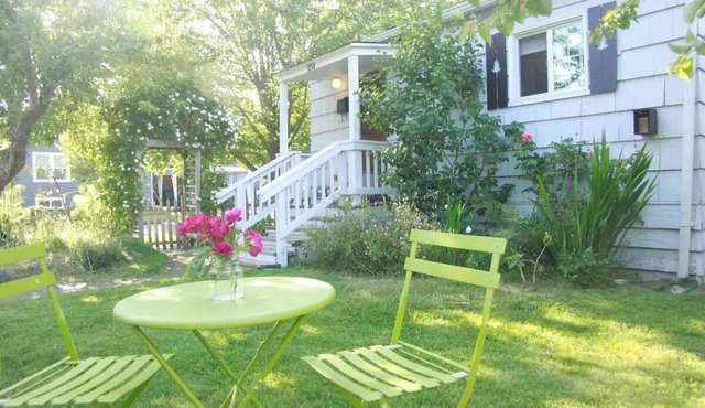 Captain's Cottage, historic cottage on corner lot.