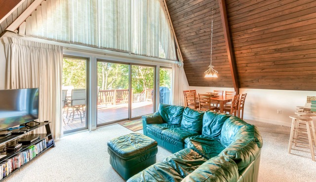 Charming, lakefront A-frame with private dock, lakeside gazebo, spacious deck