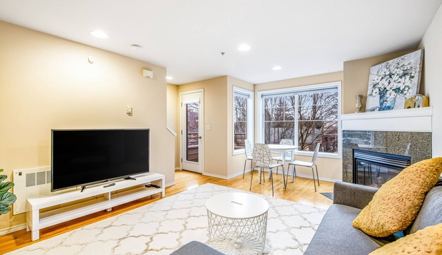Corner Townhome with Deck, Tons of Natural Light, WiFi, & Gas Fireplace