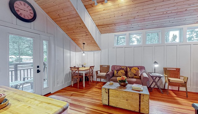 Cozy ocean view home with balcony, well-equipped kitchen, & fireplace