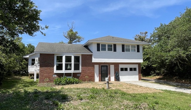 Cypress Cove, situated in Buxton on a soundfront lot, provides a peaceful setting in this charming rental cottage.