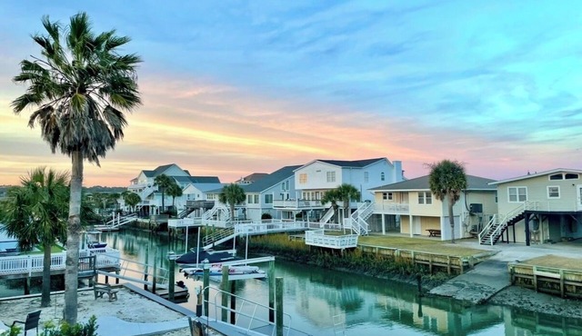 Fabulous 4-bedroom channel home with private dock in Cherry Grove Beach.