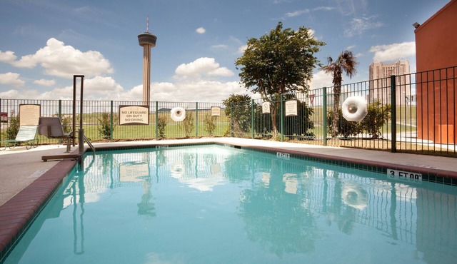 Free Breakfast + Outdoor Pool + 24-Hour Business Center | Only 3 Blocks from Gonzalez Convention Center