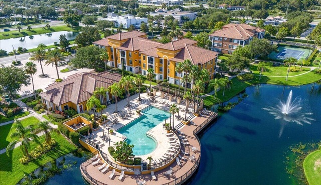 FURNISHED LAKE VIEW CONDO IN GATED RESORT STYLE SETTING