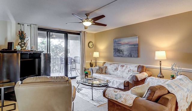 Island Club retreat with pool, hot tub, beach access & balcony