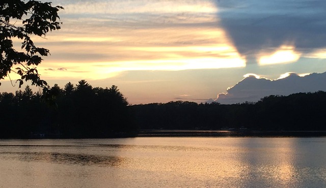 Lake front cottage on beautiful 290acre all sports Big Bass lake, Irons Michigan