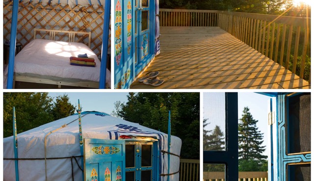 Large sky blue yurt at Cabot Shores Wilderness Resort