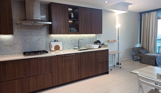 Luxury 1BR High-Rise Condo in Brentwood | Views, SkyTrain, Patio, Amenities