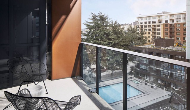 Luxury 2-BR Suite in South Lake Union: Pools, Gym, Kitchen, & Balcony