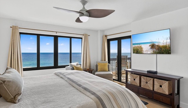 Luxury direct oceanfront corner with a large private balcony, heated pool and garage