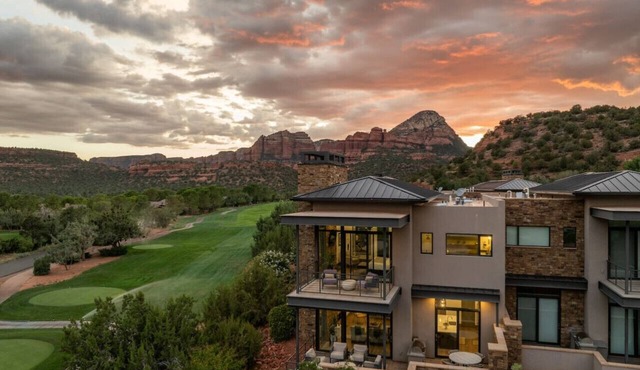 Luxury Townhome - Exclusive guest access to a members-only golf club and resort amenities including pool.