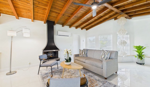 Pet-friendly 3BR beachside home with fenced yard, hot tub, Green Egg grill, and beach gear! Walk to the ocean and relax in your private coastal backyard oasis.