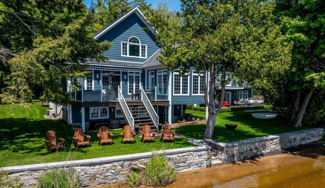 Premium family lakefront escape; 2 cottages, sandy shoreline, hot tub and more!