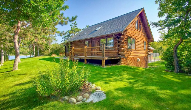 Pristine Log Cabin on 600' of Lake Shore.