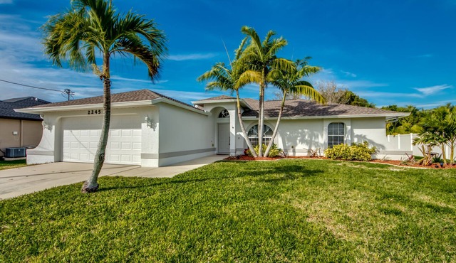 Pristine pool home ready for your vacation with friends or family .