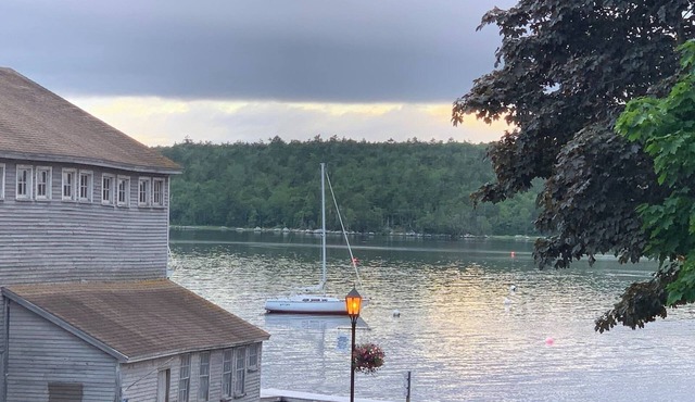 Private, cozy, furnished second floor studio in historic district with sea views