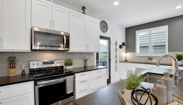 Soaring 2-level Point Venture Home on Lake Travis