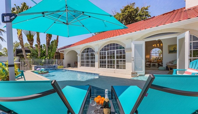 Sophisticated 3 BR waterfront Villa with heated pool, hot tub, kayaks, dock and tiki hut