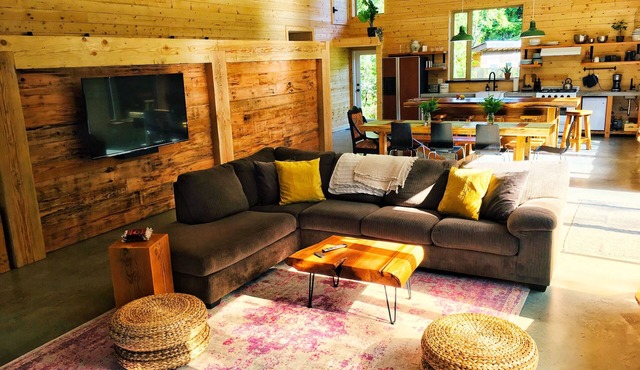 Spacious cedar home is close to beach - built with families and surfers in mind.